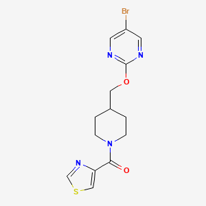 molecular formula C14H15BrN4O2S B2931357 5-Bromo-2-{[1-(1,3-thiazole-4-carbonyl)piperidin-4-yl]methoxy}pyrimidine CAS No. 2379953-52-1