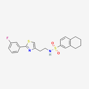 B2932440 N-{2-[2-(3-fluorophenyl)-1,3-thiazol-4-yl]ethyl}-5,6,7,8-tetrahydronaphthalene-2-sulfonamide CAS No. 932988-20-0