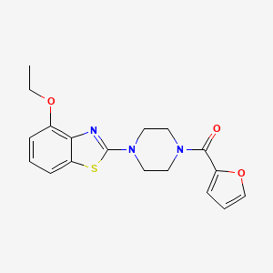 molecular formula C18H19N3O3S B2935406 4-ethoxy-2-[4-(furan-2-carbonyl)piperazin-1-yl]-1,3-benzothiazole CAS No. 897478-79-4
