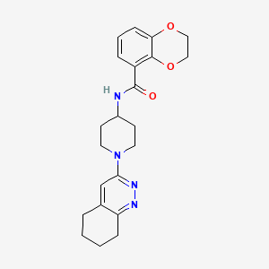 molecular formula C22H26N4O3 B2936664 N-[1-(5,6,7,8-tetrahydrocinnolin-3-yl)piperidin-4-yl]-2,3-dihydro-1,4-benzodioxine-5-carboxamide CAS No. 2034350-73-5
