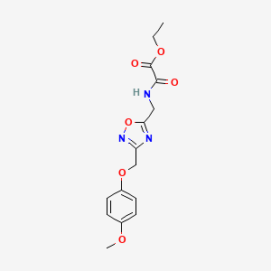 molecular formula C15H17N3O6 B2937041 Ethyl 2-(((3-((4-methoxyphenoxy)methyl)-1,2,4-oxadiazol-5-yl)methyl)amino)-2-oxoacetate CAS No. 1226451-64-4