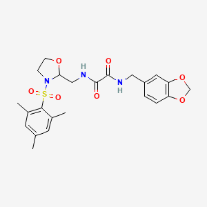 molecular formula C23H27N3O7S B2937112 N1-(benzo[d][1,3]dioxol-5-ylmethyl)-N2-((3-(mesitylsulfonyl)oxazolidin-2-yl)methyl)oxalamide CAS No. 868982-79-0