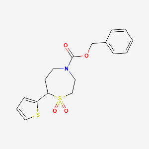 molecular formula C17H19NO4S2 B2937161 Benzyl 7-(thiophen-2-yl)-1,4-thiazepane-4-carboxylate 1,1-dioxide CAS No. 2034514-57-1