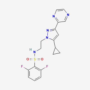 molecular formula C18H17F2N5O2S B2938497 N-(2-(5-cyclopropyl-3-(pyrazin-2-yl)-1H-pyrazol-1-yl)ethyl)-2,6-difluorobenzenesulfonamide CAS No. 2034416-40-3
