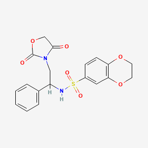 molecular formula C19H18N2O7S B2940120 N-[2-(2,4-dioxo-1,3-oxazolidin-3-yl)-1-phenylethyl]-2,3-dihydro-1,4-benzodioxine-6-sulfonamide CAS No. 2034565-00-7