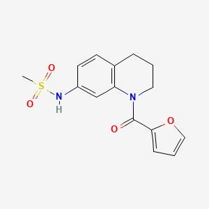 molecular formula C15H16N2O4S B2940373 N-[1-(furan-2-carbonyl)-1,2,3,4-tetrahydroquinolin-7-yl]methanesulfonamide CAS No. 946220-16-2