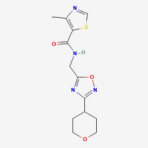 molecular formula C13H16N4O3S B2940550 4-methyl-N-{[3-(oxan-4-yl)-1,2,4-oxadiazol-5-yl]methyl}-1,3-thiazole-5-carboxamide CAS No. 2034228-07-2