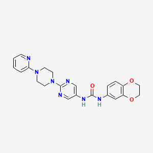 molecular formula C22H23N7O3 B2940778 1-(2,3-dihydro-1,4-benzodioxin-6-yl)-3-{2-[4-(pyridin-2-yl)piperazin-1-yl]pyrimidin-5-yl}urea CAS No. 1396889-47-6