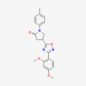 B2940858 4-(3-(2,4-Dimethoxyphenyl)-1,2,4-oxadiazol-5-yl)-1-(p-tolyl)pyrrolidin-2-one CAS No. 946376-26-7