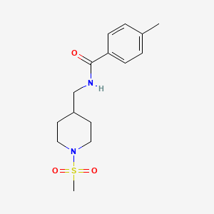 molecular formula C15H22N2O3S B2941021 N-[(1-methanesulfonylpiperidin-4-yl)methyl]-4-methylbenzamide CAS No. 1235049-97-4
