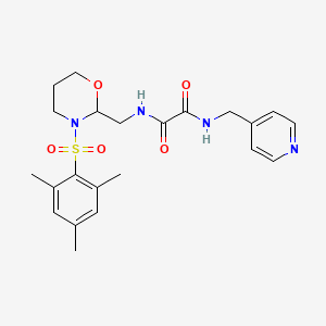 B2942899 N1-((3-(mesitylsulfonyl)-1,3-oxazinan-2-yl)methyl)-N2-(pyridin-4-ylmethyl)oxalamide CAS No. 872975-97-8