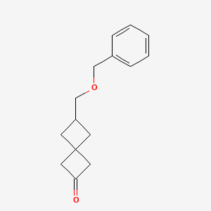 molecular formula C15H18O2 B2943062 6-(Phenylmethoxymethyl)spiro[3.3]heptan-2-one CAS No. 934824-60-9