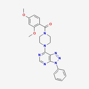 molecular formula C23H23N7O3 B2946419 1-(2,4-dimethoxybenzoyl)-4-{3-phenyl-3H-[1,2,3]triazolo[4,5-d]pyrimidin-7-yl}piperazine CAS No. 920405-24-9