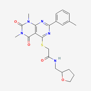molecular formula C22H25N5O4S B2946799 2-((6,8-dimethyl-5,7-dioxo-2-(m-tolyl)-5,6,7,8-tetrahydropyrimido[4,5-d]pyrimidin-4-yl)thio)-N-((tetrahydrofuran-2-yl)methyl)acetamide CAS No. 872688-25-0