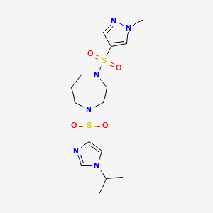molecular formula C15H24N6O4S2 B2946857 1-((1-isopropyl-1H-imidazol-4-yl)sulfonyl)-4-((1-methyl-1H-pyrazol-4-yl)sulfonyl)-1,4-diazepane CAS No. 2034403-38-6