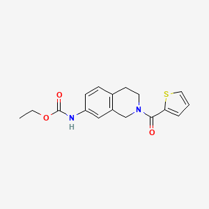 molecular formula C17H18N2O3S B2947393 Ethyl (2-(thiophene-2-carbonyl)-1,2,3,4-tetrahydroisoquinolin-7-yl)carbamate CAS No. 955641-27-7