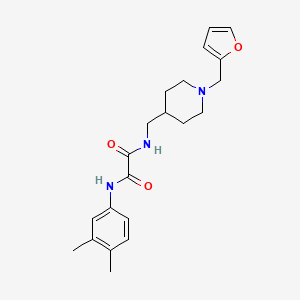 molecular formula C21H27N3O3 B2947439 N1-(3,4-dimethylphenyl)-N2-((1-(furan-2-ylmethyl)piperidin-4-yl)methyl)oxalamide CAS No. 953181-35-6