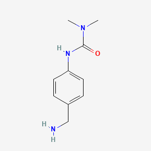 molecular formula C10H15N3O B2948545 1-[4-(Aminomethyl)phenyl]-3,3-dimethylurea CAS No. 164648-47-9
