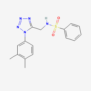 molecular formula C16H17N5O2S B2949377 N-{[1-(3,4-dimethylphenyl)-1H-1,2,3,4-tetrazol-5-yl]methyl}benzenesulfonamide CAS No. 951547-04-9