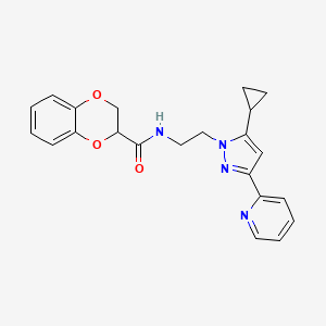 molecular formula C22H22N4O3 B2952006 N-{2-[5-cyclopropyl-3-(pyridin-2-yl)-1H-pyrazol-1-yl]ethyl}-2,3-dihydro-1,4-benzodioxine-2-carboxamide CAS No. 1797327-94-6