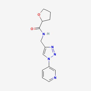 molecular formula C13H15N5O2 B2953471 N-{[1-(pyridin-3-yl)-1H-1,2,3-triazol-4-yl]methyl}oxolane-2-carboxamide CAS No. 2034311-76-5