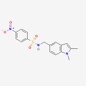molecular formula C17H17N3O4S B2954911 N-[(1,2-dimethyl-1H-indol-5-yl)methyl]-4-nitrobenzene-1-sulfonamide CAS No. 852139-27-6
