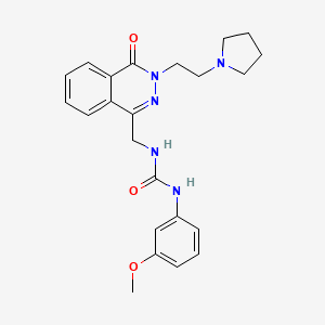 1-(3-Methoxyphenyl)-3-((4-oxo-3-(2-(pyrrolidin-1-yl)ethyl)-3,4-dihydrophthalazin-1-yl)methyl)urea
