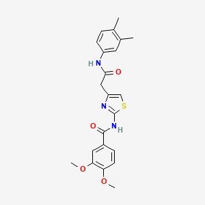 molecular formula C22H23N3O4S B2958893 N-(4-{[(3,4-dimethylphenyl)carbamoyl]methyl}-1,3-thiazol-2-yl)-3,4-dimethoxybenzamide CAS No. 1005295-10-2