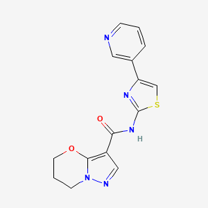 molecular formula C15H13N5O2S B2962115 N-(4-(pyridin-3-yl)thiazol-2-yl)-6,7-dihydro-5H-pyrazolo[5,1-b][1,3]oxazine-3-carboxamide CAS No. 1428358-14-8