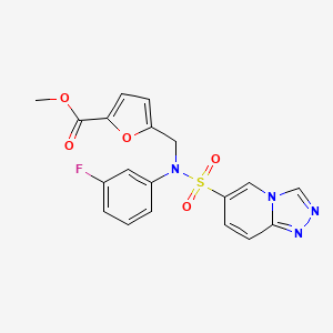 molecular formula C19H15FN4O5S B2964727 methyl 5-{[N-(3-fluorophenyl)[1,2,4]triazolo[4,3-a]pyridine-6-sulfonamido]methyl}furan-2-carboxylate CAS No. 1251605-07-8
