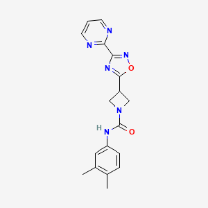 molecular formula C18H18N6O2 B2965245 N-(3,4-dimethylphenyl)-3-[3-(pyrimidin-2-yl)-1,2,4-oxadiazol-5-yl]azetidine-1-carboxamide CAS No. 1324679-05-1