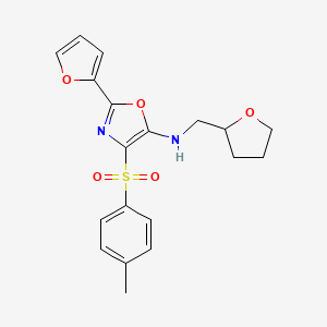 2-(furan-2-yl)-4-(4-methylphenyl)sulfonyl-N-(oxolan-2-ylmethyl)-1,3-oxazol-5-amine