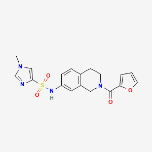 molecular formula C18H18N4O4S B2967396 N-(2-(furan-2-carbonyl)-1,2,3,4-tetrahydroisoquinolin-7-yl)-1-methyl-1H-imidazole-4-sulfonamide CAS No. 1428373-31-2