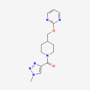 molecular formula C14H18N6O2 B2970167 (1-Methyltriazol-4-yl)-[4-(pyrimidin-2-yloxymethyl)piperidin-1-yl]methanone CAS No. 2379987-60-5