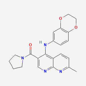 molecular formula C22H22N4O3 B2971159 N-(2,3-dihydro-1,4-benzodioxin-6-yl)-7-methyl-3-(pyrrolidine-1-carbonyl)-1,8-naphthyridin-4-amine CAS No. 1251616-64-4