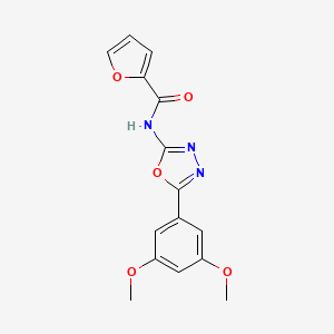 molecular formula C15H13N3O5 B2971417 N-[5-(3,5-dimethoxyphenyl)-1,3,4-oxadiazol-2-yl]furan-2-carboxamide CAS No. 865286-91-5