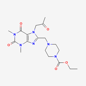molecular formula C18H26N6O5 B2971492 ethyl 4-{[1,3-dimethyl-2,6-dioxo-7-(2-oxopropyl)-2,3,6,7-tetrahydro-1H-purin-8-yl]methyl}piperazine-1-carboxylate CAS No. 893944-28-0