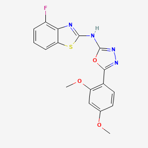 molecular formula C17H13FN4O3S B2971500 N-[5-(2,4-dimethoxyphenyl)-1,3,4-oxadiazol-2-yl]-4-fluoro-1,3-benzothiazol-2-amine CAS No. 862975-19-7