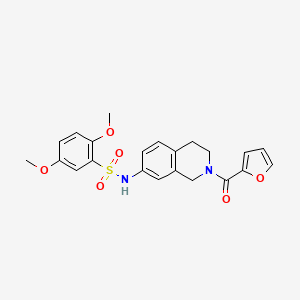 molecular formula C22H22N2O6S B2972758 N-(2-(furan-2-carbonyl)-1,2,3,4-tetrahydroisoquinolin-7-yl)-2,5-dimethoxybenzenesulfonamide CAS No. 955776-60-0