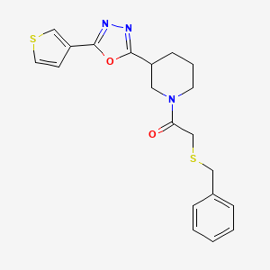 B2973917 2-(Benzylthio)-1-(3-(5-(thiophen-3-yl)-1,3,4-oxadiazol-2-yl)piperidin-1-yl)ethanone CAS No. 1797259-51-8