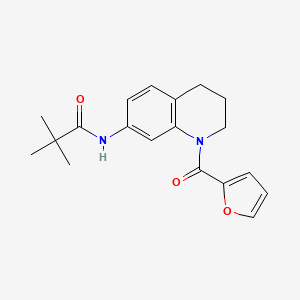 molecular formula C19H22N2O3 B2974274 N-[1-(furan-2-carbonyl)-1,2,3,4-tetrahydroquinolin-7-yl]-2,2-dimethylpropanamide CAS No. 946265-68-5