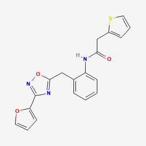 molecular formula C19H15N3O3S B2974281 N-(2-((3-(furan-2-yl)-1,2,4-oxadiazol-5-yl)methyl)phenyl)-2-(thiophen-2-yl)acetamide CAS No. 1798018-85-5