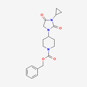 molecular formula C19H23N3O4 B2974871 Benzyl 4-(3-cyclopropyl-2,4-dioxoimidazolidin-1-yl)piperidine-1-carboxylate CAS No. 2097892-28-7