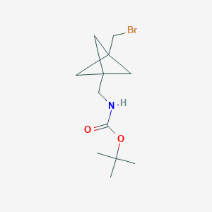 molecular formula C12H20BrNO2 B2975288 tert-butyl N-{[3-(bromomethyl)bicyclo[1.1.1]pentan-1-yl]methyl}carbamate CAS No. 2137518-72-8