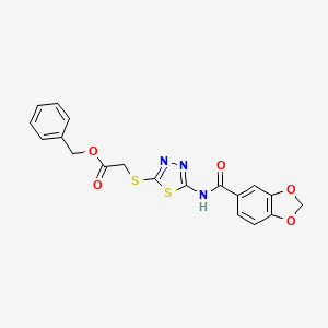 molecular formula C19H15N3O5S2 B2975497 苄基 2-[[5-(1,3-苯二氧杂环-5-羰氨基)-1,3,4-噻二唑-2-基]硫代]乙酸酯 CAS No. 476466-00-9