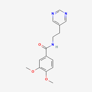 molecular formula C15H17N3O3 B2975930 3,4-dimethoxy-N-(2-(pyrimidin-5-yl)ethyl)benzamide CAS No. 2034603-33-1