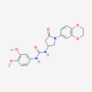 molecular formula C21H23N3O6 B2976367 3-[1-(2,3-dihydro-1,4-benzodioxin-6-yl)-5-oxopyrrolidin-3-yl]-1-(3,4-dimethoxyphenyl)urea CAS No. 894040-44-9