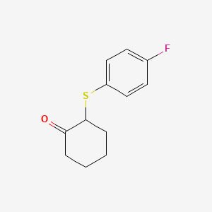 2-[(4-Fluorophenyl)sulfanyl]cyclohexan-1-one