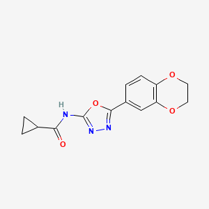 molecular formula C14H13N3O4 B2977439 N-[5-(2,3-dihydro-1,4-benzodioxin-6-yl)-1,3,4-oxadiazol-2-yl]cyclopropanecarboxamide CAS No. 862808-55-7
