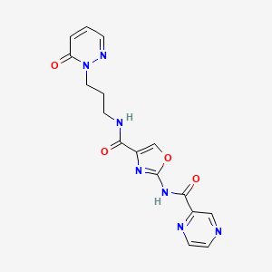 molecular formula C16H15N7O4 B2977741 N-(3-(6-oxopyridazin-1(6H)-yl)propyl)-2-(pyrazine-2-carboxamido)oxazole-4-carboxamide CAS No. 1396679-73-4